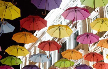 Fototapeta na wymiar Many multiple colors umbrella with night sky
