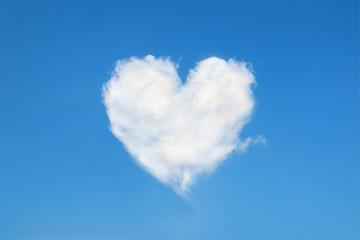 heart shaped cloud in the blue sky - Powered by Adobe