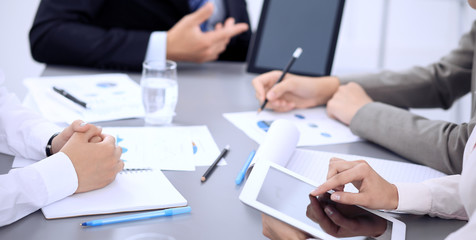 Business people group working together in office, close-up. Meeting and communication concept