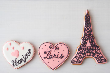 Gingerbread on the subject of France on white table. Heart, eiffel tower, paris. Love theme, valentine. Top view.