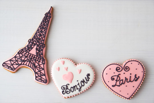Gingerbread on the subject of France on white table. Heart, eiffel tower, paris. Love theme, valentine. Top view.