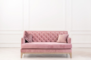 Modern living-room minimalistic  interior with pink sofa near empty white wall. - Image