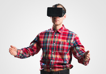 Guy in mask experiencing virtual reality as new entertainment device
