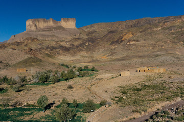 Morocco tourism: trekking man in mountains. Atlas mountains, Jebel Sakhro (Djebel Sahro), Ourzazate, Morocco