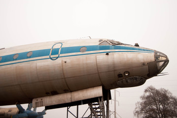  the bow of an old passenger plane in the fog