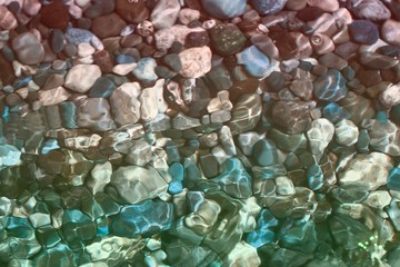 brilliant river boulders wet by water texture - pretty abstract photo background