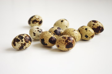 Fototapeta premium Quail eggs on white background , healthy and diet food, protein concept