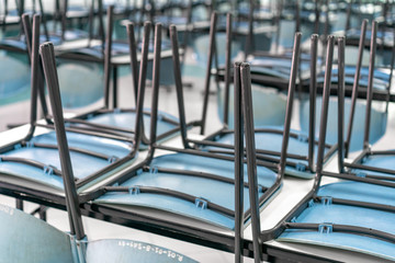chair on the table in the closed canteen