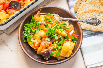 Steamed organic vegetables - potatoes, eggplant, peppers, tomatoes and onions.