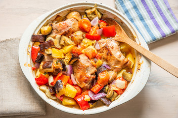 Homemade chicken stew with vegetables in a large pot - healthy organic food.