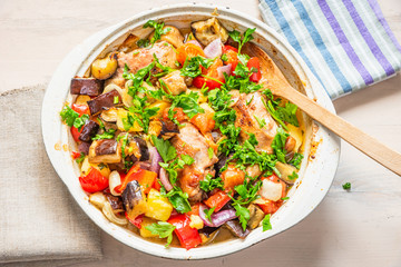 Homemade chicken stew with vegetables in a large pot - healthy organic food.