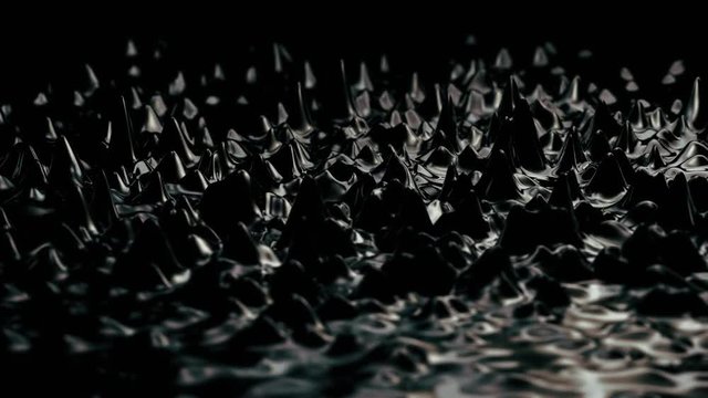 Black liquid surface, abstract, oil, fluid, ferrofluid medium shot