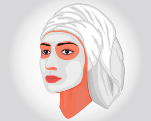 Close-up portrait of a beautiful young woman in half a turn isolated on white background with white cosmetic mask on her face and a towel on her head