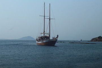 Fototapeta na wymiar Drifting sailboats in Athens