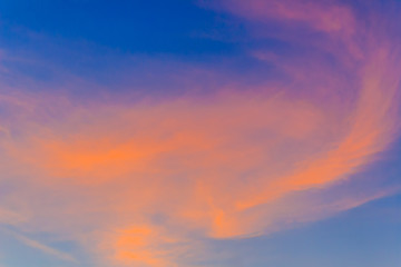  Red clouds on blue sky in twilight evening. Beautiful sunset sky with blue and red background. Dramatic colorful of dusk and dawn sky with blue sky and red clouds.