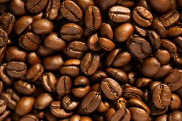 Close up roasted coffee beans background