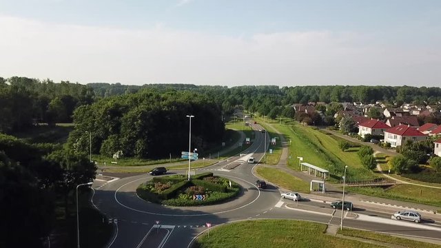 Drone view of a roundabout in Dronten, Flevoland, The Netherlands. Lifting up.