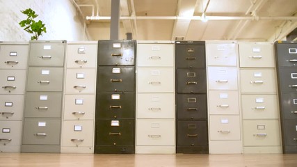 Filing cabinets in an open office space.