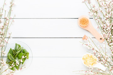 Beauty and fashion concept with spa set on pastel rustic wooden background.