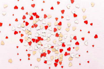 Happy Valentines day background. With small color hearts on gray background.