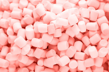 Background or texture of colorful mini marshmallows.