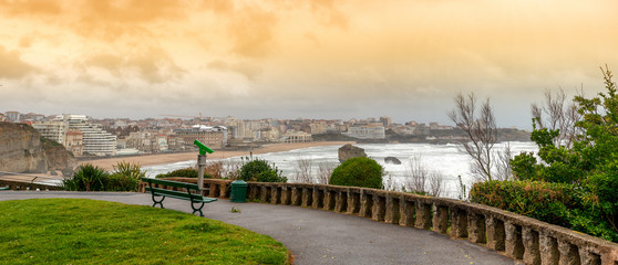 Obraz na płótnie Canvas famous Biarritz beach (Pays Basque, France) with ocean waves, bad weather