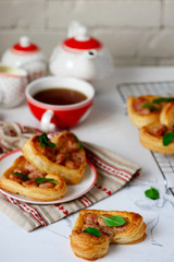 Puffs with sausages in heart shapes. Valentine's Day Breakfast