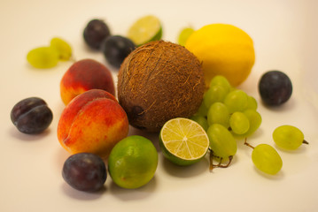 Mix of Fresh Fruits on wooden table with copy space