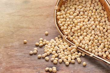 Soybean was poured on the wooden table.