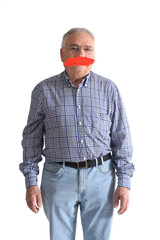 Fototapeta premium senior man with mouth covered on white
