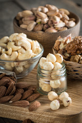 mix of nuts on a wooden table