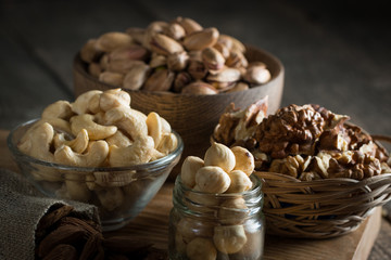 mix of nuts on a wooden table