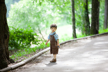A little boy in an old park