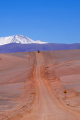 4x4 offroad vehicle on the road to Paso Pircas Negras mountain pass, Argentina to Chile, La Rioja, South America