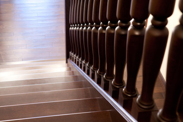 Modern brown oak wooden stairs, view from top, classic home style beauty