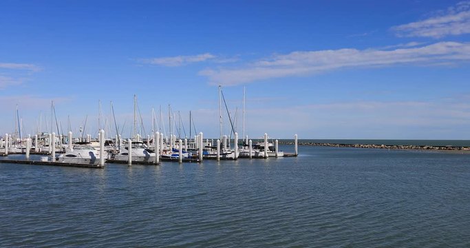 Corpus Christi Texas harbor Marina sailboats. South Texas tourism travel destination. Waterfront marina, port harbor and scenic byway.  Humid subtropical climate makes a year round vacation city. 