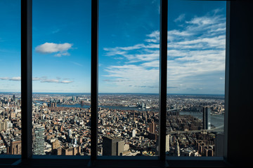 Fototapeta na wymiar View out of window from a skyscraper in Manhattan, New York City 