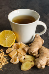 Hot ginger tea with lemon, close up
