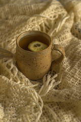 Hot tea with lemon in a vintage mug