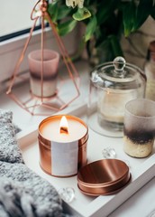 Elegant home decoration with wooden wick burning candle
