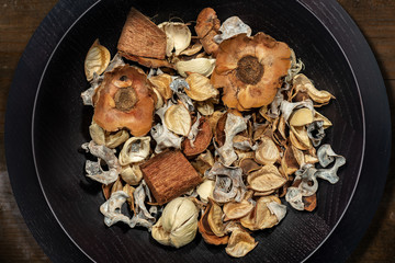Potpourri - Scented dry plants in wooden bowl
