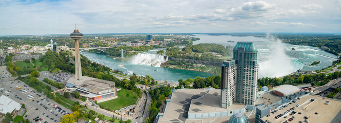 Aerial view of the Skylon Tower and the beautiful Niagara Falls - obrazy, fototapety, plakaty