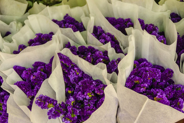 Purple statice flowers for sale in the flower market, Bangkok, Thailand.