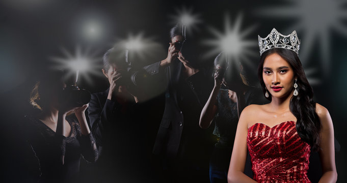 Miss Asian Pageant beauty contest with Silver Diamond Crown red sparkle sequin gown with back view of reporter photographers shoot photo fire flash light to celebrity queen of night, copy space