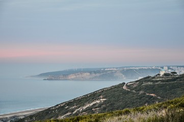 Entardecer junto ao mar