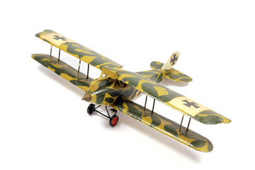 Vintage Toy Aircraft Models on White Background