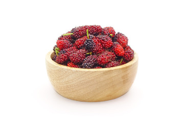 Mulberry : Fresh mulberries in wooden bowl isolated on white background.