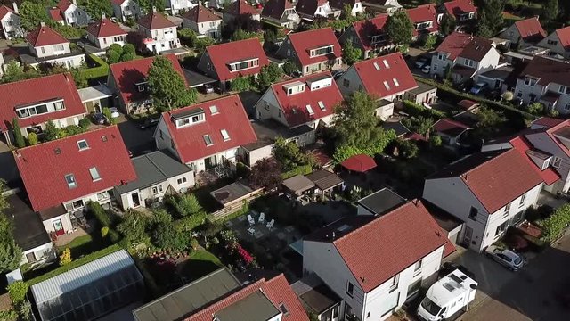 Drone view of the lovely town of Dronten in Flevoland, the Netherlands. Low pass and reveal.
