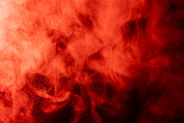 colored red smoke on black background