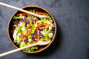 Greek salad with fresh vegetables, feta cheese and black olives